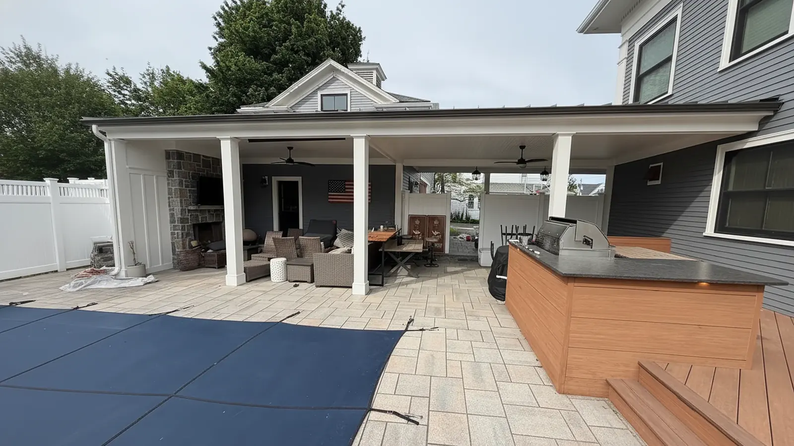 Covered patio with white trim, clean surfaces
