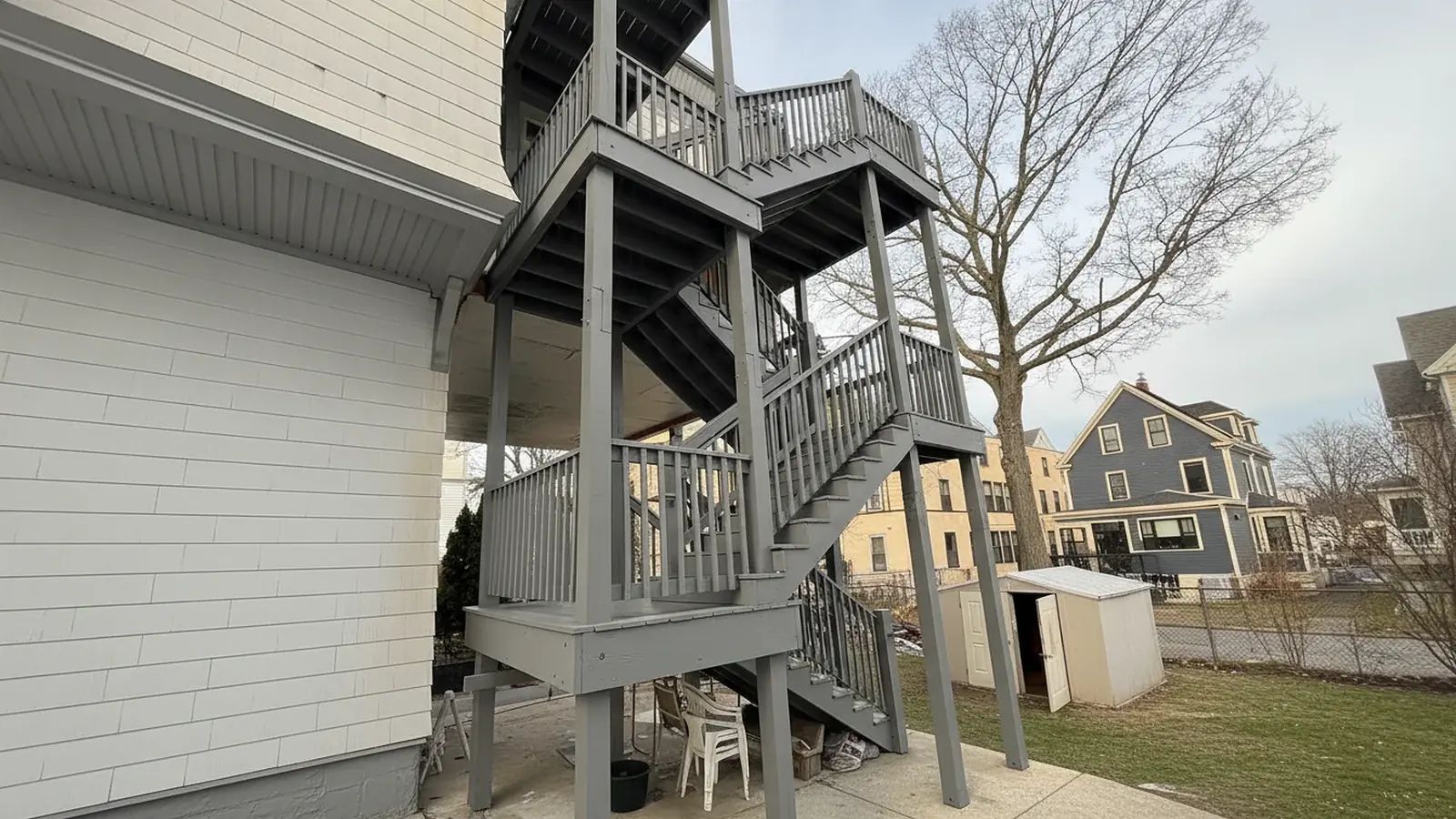 Clean gray back porch and deck after washing and painting