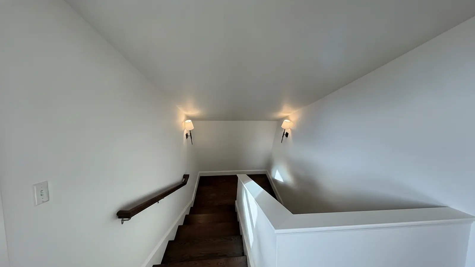 Stairwell with freshly painted white walls