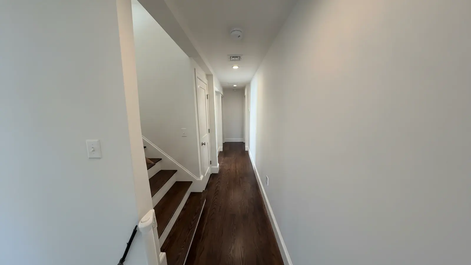 Long white hallway after interior painting