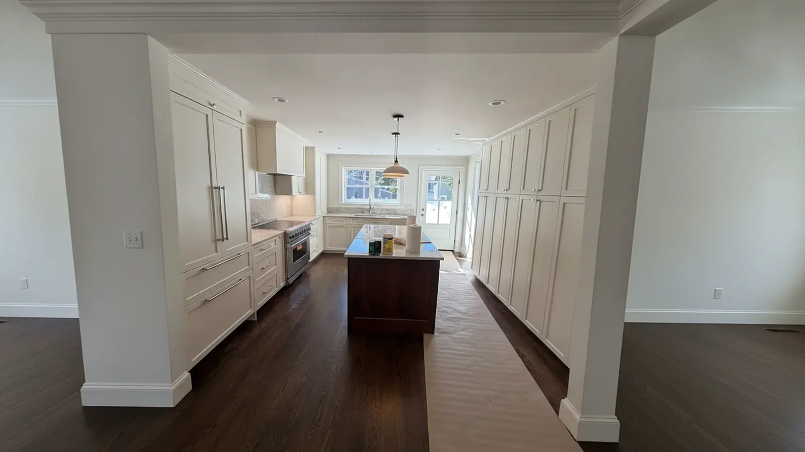White kitchen with freshly painted walls
